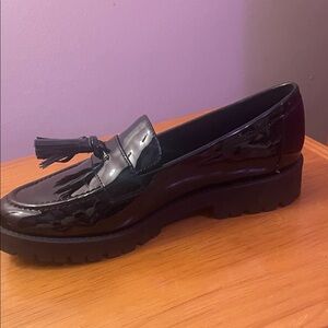 Bandolino Black Patent Tassel Lug Sole Loafer